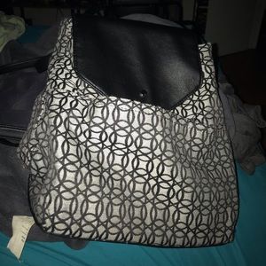 front pocket w/ button pocket with additional Button to close the purse